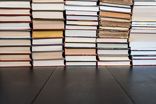 Piles of school textbooks