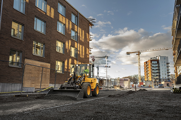 New grading bucket hands compact wheel loaders the muscle to move dirt