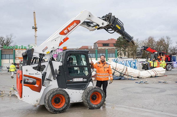 Bobcat S86 loader installs 300 iron anchors to secure circus tent
