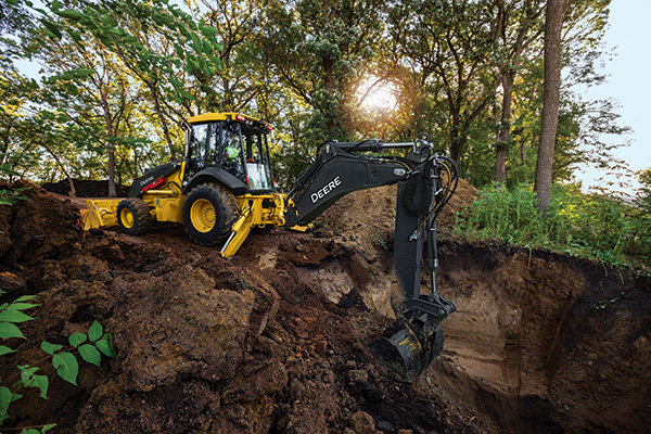 Backhoe loaders centre mount or side shift